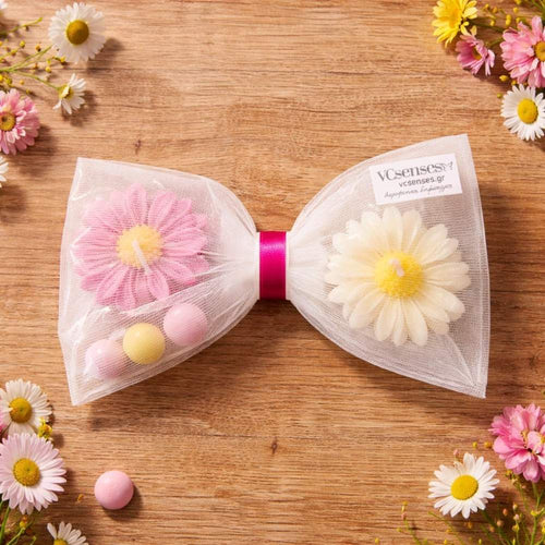 Μπομπονίερα κερί μαργαρίτα σε φιόγκο